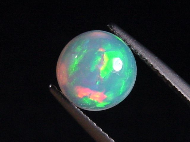 Opal 1,57 Ct. finest quality - round cabochon