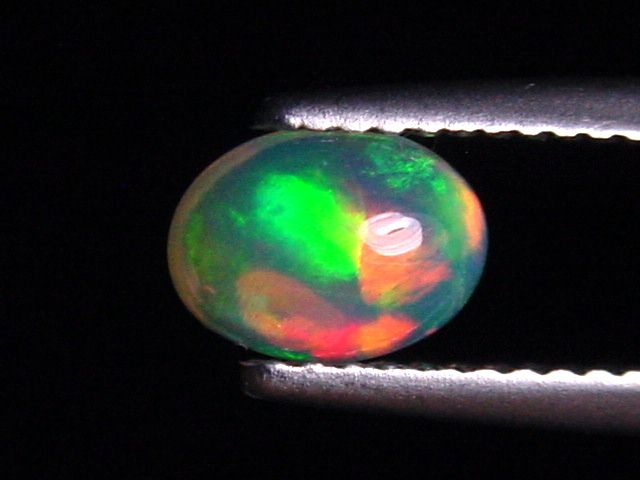 Opal 0,56 Ct. finest quality - oval cabochon