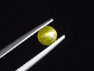 Chrysoberyll Katzenauge 0,65 Ct. Rund Cabochon Sri Lanka