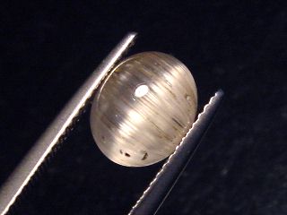 Topas Katzenauge 3,36 Ct. selten Oval Cabochon - Minas Gerais, Brasilien