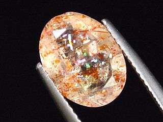 Quartz with Hematite 2,54 Ct. natural confetti inclusions