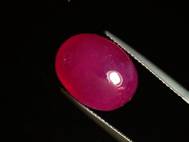 Ruby 21,14 Ct. oval cabochon - rosered - treated