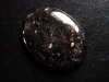 Bronzite 63,15 Ct. oval cabochon with fine shimmer