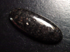 Bronzite 36,60 Ct. oval cabochon with fine shimmer