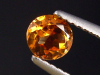 Spessartit Granat 0,59 Ct. leuchtend orange 5 mm Rund Tansania