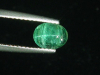 Smaragd Katzenauge 0,78 Ct. Oval Cabochon Kolumbien